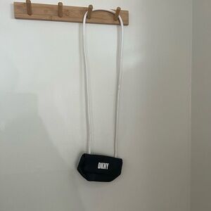 DKNY Black and White Mini Bag carried once fits large iPhone